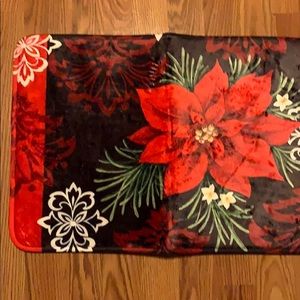 Poinsettia shower rug